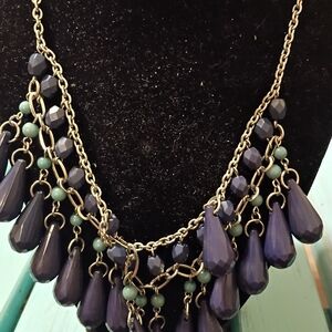 Blue and silver necklace with an extender